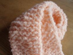 ベビーピンクのマフラー